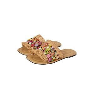 Free People Shipwrecked Sandalwith a raffia strap and bead embellishments.